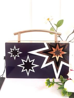 BCBGMaxAzria Purple Star-Print Top Handle Clutch with Gold Accent